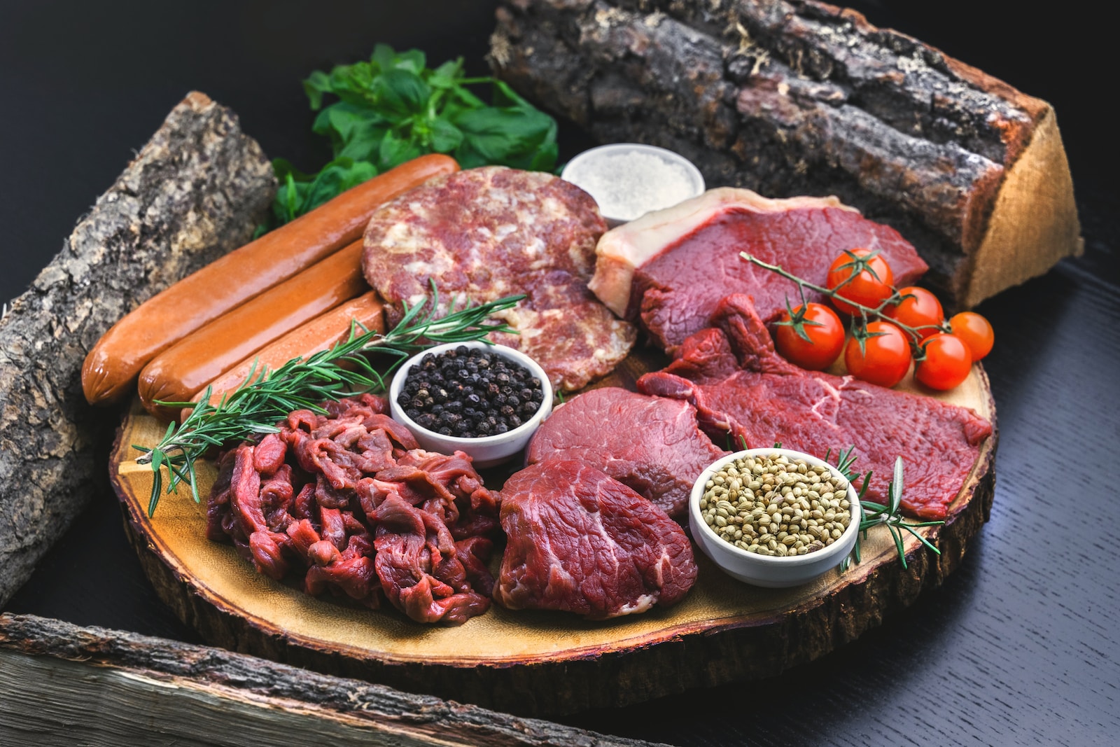 raw meat on white ceramic plate